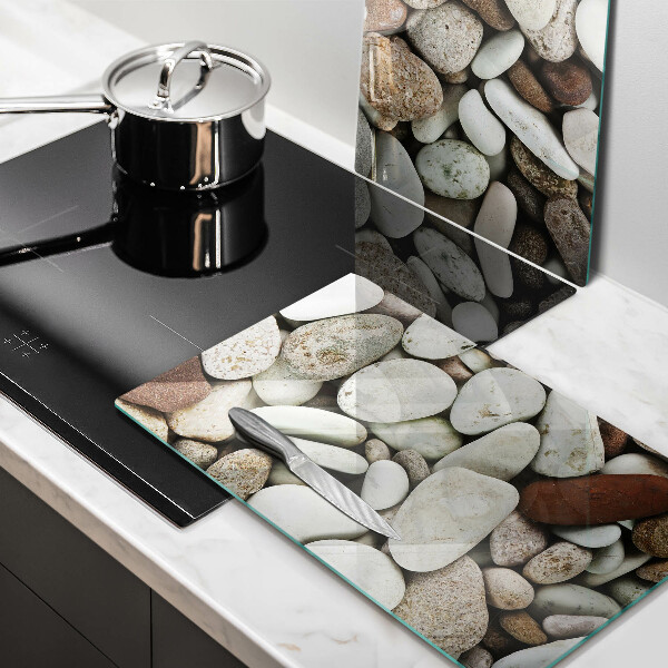 Üveg vágódeszka Kis kövek háttér
