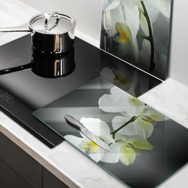 Üveg vágódeszka Fehér orchidea virágok