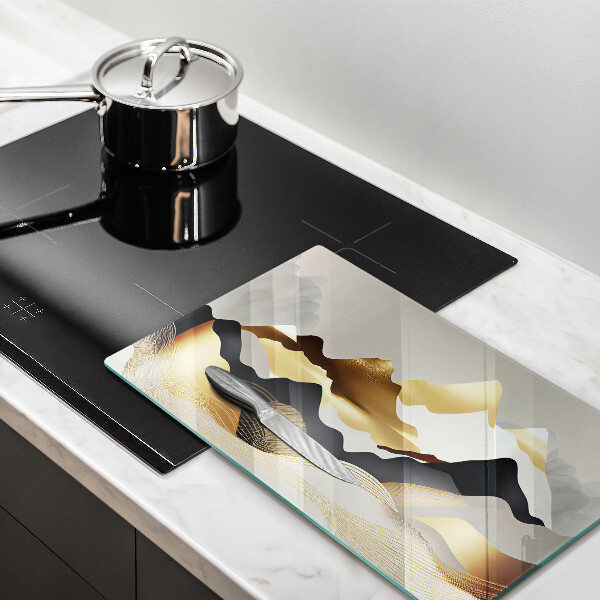Üveg vágódeszka Absztrakt arany hegyek