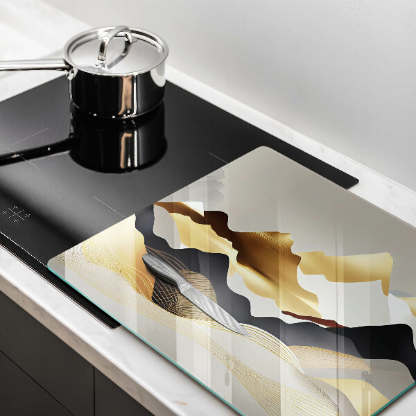 Üveg vágódeszka Absztrakt arany hegyek