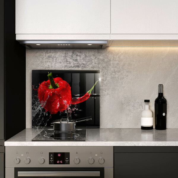 Tűzhelyvédő üveglap Piros paprika vízben