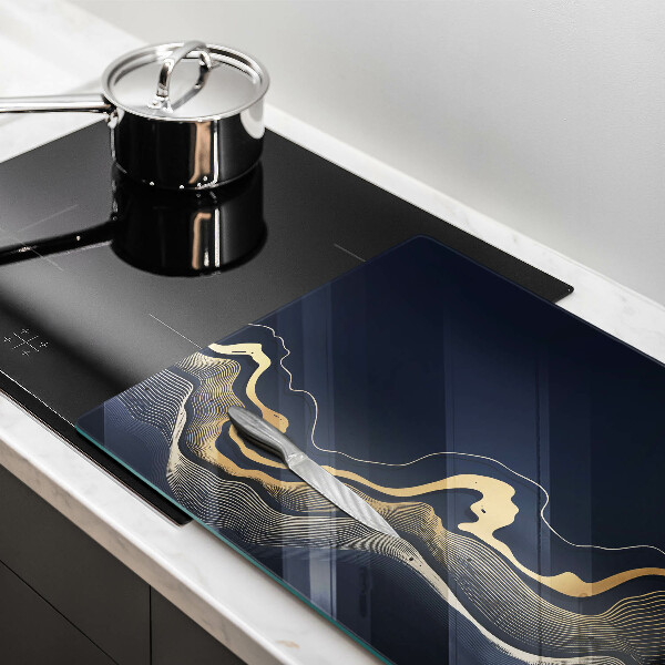 Tűzhelyvédő üveglap Absztrakt arany vonalak