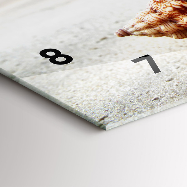 Vízszintes üvegóra Egy kagyló a tengerparton