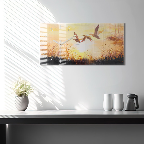 Vízszintes üvegóra Daruk naplementekor