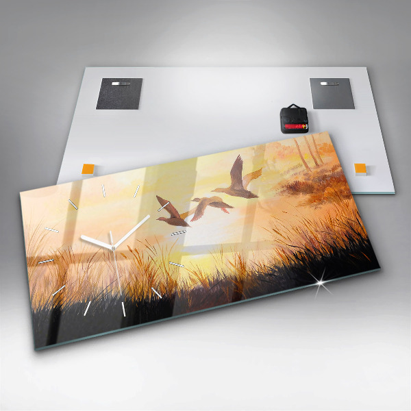 Vízszintes üvegóra Daruk naplementekor