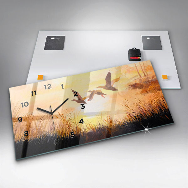 Vízszintes üvegóra Daruk naplementekor