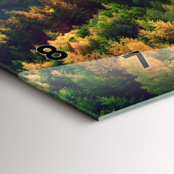 Vízszintes üvegóra Naplemente a dombok felett