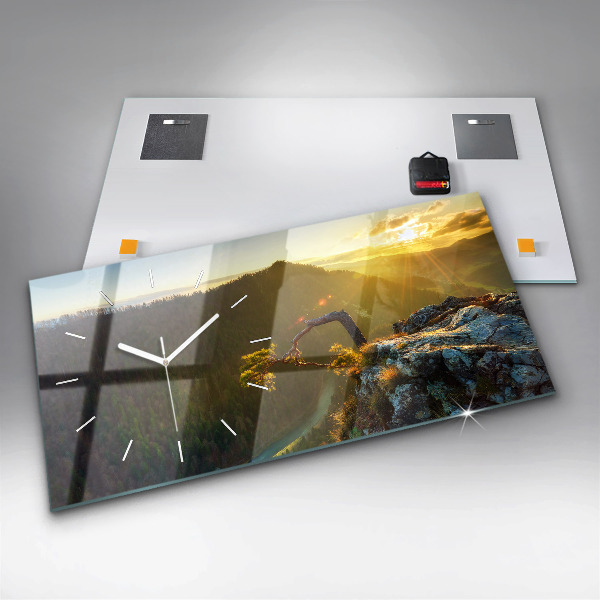 Vízszintes üvegóra Naplemente a hegyek felett