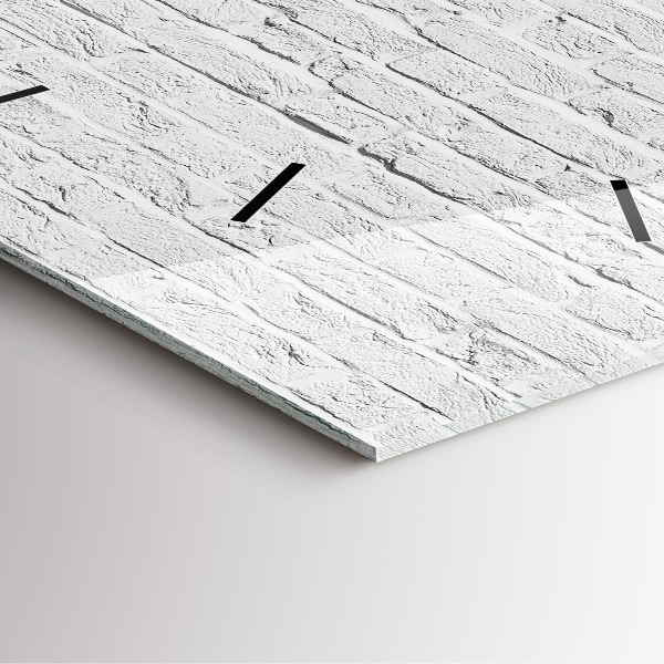 Szögletes fali üvegóra Egy fal világos téglából