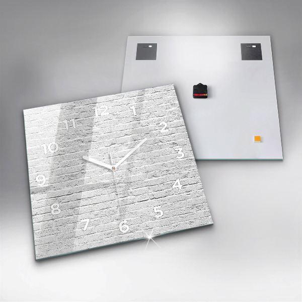 Szögletes fali üvegóra Egy fal világos téglából