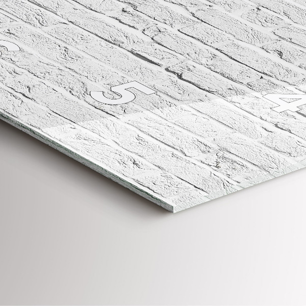 Szögletes fali üvegóra Egy fal világos téglából