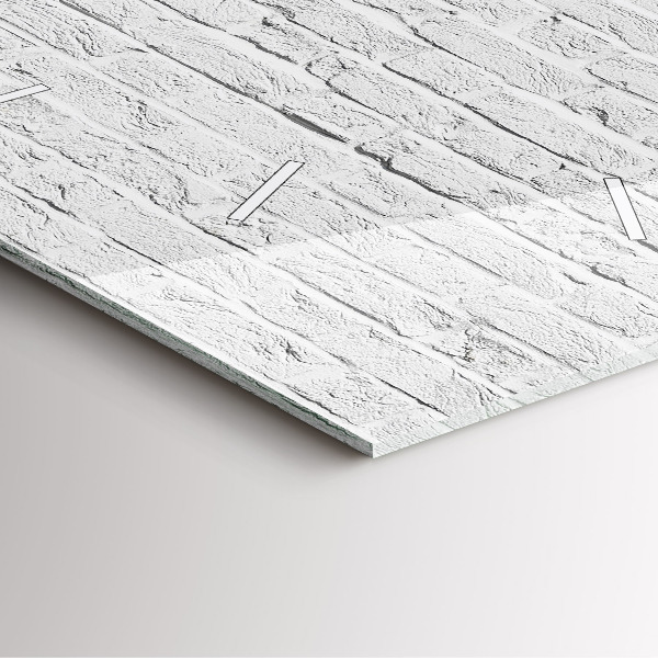 Szögletes fali üvegóra Egy fal világos téglából