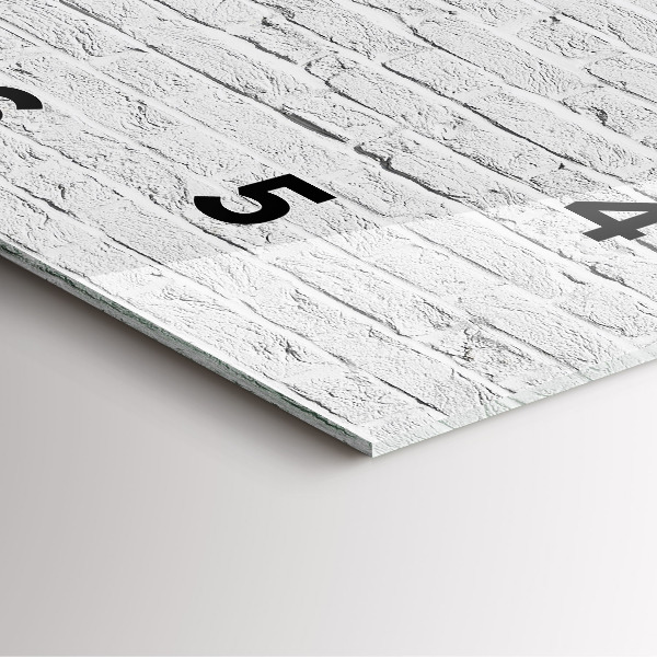 Szögletes fali üvegóra Egy fal világos téglából