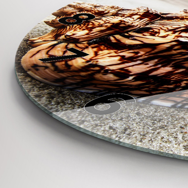 Kerek fali üvegóra Egy kagyló a tengerparton